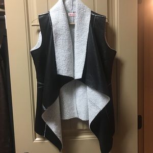 Sherpa inspired faux leather vest